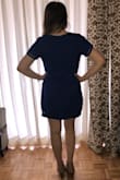 This is a very flattering shift dress! There's a second layer under the top layer, so the dress lays smooth. I wore it for a more casual graduation reception. It could definitely be dressed up or down. A size small probably would have worked for me, but the medium looked fine, so I decided to keep it. I don't think it runs too big though. I think I just ordered the wrong size! - Anna L.