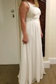Absolutely beautifully made. The zipper was a little hard to get up, but once it was on it was fine. I felt like princess in it and received tons of compliments. - Chasity M.