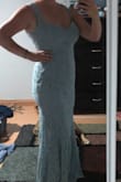 I was worried how the cut would look because I am a little more curvy and I didn't think the waist would be flattering. It turned out great and I look forward to wearing it to a formal wedding. - Kylie S.