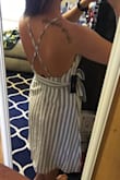 This dress is so adorable. I'm really glad I decided to go with a small instead of a medium because it fits great. (bust area is a little loose, but if you tighten the adjustable straps it's fine) The waist feels a little loose without the sash tied, but the sash makes it perfect. It hits right below the knee, which is also perfect. The dress looks great with a sticky backless bra. So excited to wear it! - Kristen F.