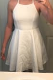 I absolutely LOVE this dress! It is so comfy, pearls are delicate, and has a great neckline. Very happy that it wasn't too short on me, and had enough material that you can't see your underwear, and can wear no bra! Definitely recommend getting this flattering dress! - Briana T.