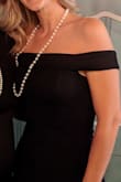 I purchased this dress for a "Tiffany" themed bridal shower and wore it to a Kentucky Derby party. I received so many compliments. I will admit it was a little difficult to move my arms at times. But as long as you don't have to reach up very high you should be fine. Otherwise it was a perfect fit. - Ameri T.