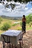 This dress is gorgeous. The fit is very flattering. I ordered a size M because of my larger cha chas, or I probably would have order a small. 32 DD. Can dress it up or dress it down. I wore mine wine tasting. - Jasmine