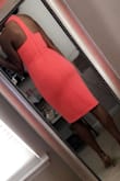 I bought this dress in coral, the color is absolutely beautiful in person! It fits amazing and the fabric has some stretch to it which I love. Definitely recommend this buy! - Shakira S.