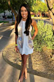 I wore this for my college graduation. It's super comfy, light, and fun! I like the adjustable straps and detail and the bottom. However, it was a little tight. I decided to keep the XS but I think a small would've been more comfortable. - Kaitlin G.