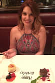 I wore this dress for my birthday and I absolutely love it! There was some slight upper side boob action due to the way the top is cut, but I didn't feel like I was going to fall out. I also surprisingly didn't have to wear a bra, which never happens. The bottom is forgiving in the hips and hid my food baby, but still had a slightly fitted sleek look. Can't wait to wear it again! - Stephanie D.