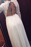 I will be eloping with my fiance this August and we want to keep it very intimate and inexpensive. I fell in love with this dress the second I saw it. The only thing I was hesitant about was choosing a size. The reviews between size Small and Mediums weren't very helpful so I'm here to say if you are in the same boat as I was, order a size up and alter like I will be doing. It fits beautifully in most places but if you're average height like I am, you'll need to alter anyways. Super excited to wear it in a couple months and most likely get praise from my fiance for how much money I saved haha! - Breanna C.