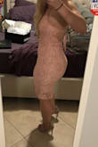 I originally ordered this in an XS but had to return, the size small was a great fit, however, if you're like me and tend to be a little more bottom heavy this may not be very comfortable.  It was a little tight around my bottom and thighs. Very beautiful dress, with a nice soft lace material.  The color is a bit more pink than the online photo but it's a gorgeous color for springtime.  One star knocked off because of the awkward stitching in the waistline.  The slip part of the dress underneath the lace was sewn together at the waistline area and creates what looks to be a wrinkle in the waistline, as if the bottom slip portion was scrunched underneath the lace.  It just looks a little weird but it's not a deal breaker for me.  Also, there is no stretch to this dress so. - Brittany M.