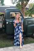 I loved this dress. I purchased it so that I could wear it to a wedding but plan on wearing it again to brunch. I got a few inches hemmed off of the bottom so that I can wear it with heels and flats. My only critique is that I wish I knew how to wrap the dress. I asked another wedding guest if it was wearing it right by tying it in the front and I wasn't....so for those who are also confused-wrap one of the strings through the armpit on the right armpit area and then tie both strings in the back. You're welcome! ;) - Chelsea S.