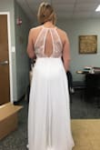 I have a short waist and wanted to love a low-back dress so much but they just don't look right on me. This dress surprised me so much. I absolutely love it!! It's slimming and feminine with just a touch of flare. - Caroline S.