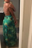 Love this dress! You can dress it up or down with heels or flats. Great light weight material with a beautiful design that is elegant and sexy! Looks like the picture. My husband loves it! Can't wait to wear it in Costa Rica! - Jessica D.