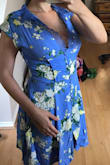 Lovely. Just the v neck doesn't lay as nice as the photo. But was on sale. Sundress. Fits nice otherwise. Intense rich colors. Keeper! - Jennifer G.