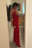 This jumpsuit is gorgeous!!! The color is brilliant. It is lined at the bottom and has pockets. It wasn't too long. I paired it with red heels. So many people commented on my outfit. I absolutely love this outfit. I felt so sexy in it. - Shannon W.