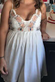 It's exactly what I was expecting. It gets wrinkled pretty easily but I just ironed it before I wore it. It was not see through at all and I love the adjustable straps. I didn't even have to wear a bra because the top is very supportive. - Mason G.