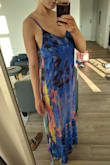 This is such a beautiful dress and can be worn to a variety of events. The colors pop and flatter all skin tones.
I'm 5'9" and it just skims the ground, although the straps are adjustable if you really needed to let it out. - Leah M.
