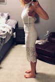 I bought a bunch of white dresses for my bridal showers and thought this one would have been my favorite actually. I initially ordered the small (I feel like most Lulus brands run really small), but it was way too loose up top (I'm a 32 DD). I ordered the xs which fit much better, but was still a weird fit on top (almost like it would fit better on someone much taller with a taller torso). If I had kept it I would have altered the neck and had the snaps tighter. Overall, it was beautiful, just didn't work for my body type. - Lauren K.