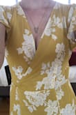 Love this dress. After reading the reviews, I opted for XS instead of S and it was the right call for me as I didn't want it too loose-fitting. Works with any bra and any bra size (I'm a 32 DD). As always with being 5' 4", was a bit too long (even with heels). I wore it out, but the hem is dirty now so I'll likely get it hemmed. Classy and gorgeous, I absolutely love it! The color yellow is a little more mustard than marigold - see photos (no filter). - Katrina B.