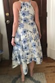 I ordered this dress for my bridal shower and it was perfect! Beautiful dress, I received tons of compliments on it!! Only negative is it was very wrinkled and has tons of fabric that took a while to iron. - Elin O.