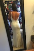 I ordered a handful of dresses from Lulu's as potential elopement dresses and this is the one I decided to keep. It's absolutely beautiful and such a classic, timeless style. The fit is perfect - not too tight or loose and was very comfortable on. While it is quite fitted throughout, the material did a great job of hiding any imperfections. Very happy with my purchase! - Olivia M.