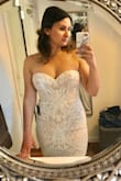 Beautiful beaded dress. Am thinking of wearing it for my wedding. Very heavy and good quality. Some stretch as well so it's comfy! - Christine