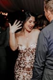 My pictures do not do this dress justice because I gained a bit of weight before wearing it. It is a very heavy amazing quality dress. I received SO many compliments on it. Worn as a bridesmaid dress. Wonderful fit and details. - Christine