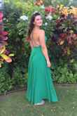 I own this dress in two colors. The green and burgundy. I bought the green years ago and the burgundy this year. It has changed...for the better. Now the little part in back with the zipper has a little elastic in it for easy fit without squeezing out your back fat! Before that was my only complaint is that it was a tiny bit tight in the waist. - Christine