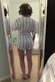 Fabric is very high quality and I love the fit, especially the length. Even though I'm not very tall it can be hard to find rompers that are long enough. I added a snap so it doesn't fall open and show my bra. I'm sure a tailor would do this for cheap or you could go without a bra. - Caroline P.