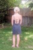 Although the simplest dress I have purchased from Lulus - I can confidently say this is by FAR my favorite summer dress.  Great quality! Nice and thick material (confidently go without a bra). The back is absolutely adorable. I love the simplicity. Love love love! - Jenna D.