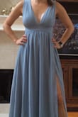 I ordered all the dresses available in slate blue because I am a bridesmaid in my sister's wedding. Literally every one of them for in an extra small except for this one. I could get it zipped. Ultimately I loved the way it looked and ended up ordering the small....overall very flattering on many body types. - Stephanie M.