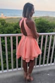 This dress is amazing! I ordered the peach for my cousin's beach wedding and the color was beautiful against my tanned skin. It fit perfectly. I love the open back. I got sooo many compliments on how cute my dress was! - Amanda M.