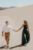 Love this dress, I took our engagement pictures at the sand dunes and knew the dark green would be PERFECT.  I did end up losing some weight, so I would've gotten an XS instead of a S but it still worked absolutely perfectly and love it. - Shannon P.