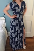 I loved wearing this dress! It felt great on and I got a lot of compliments. It does run very long. I ordered an XS, wore 5 inch wedges, and it was perfectly floor length. Even with the dress tied as tightly as possible, I had to use body tape on the chest area too keep it from falling open over my bra because I have a small chest. The tape held up well and you totally couldn't tell, it looked great all night. - Joeline K.