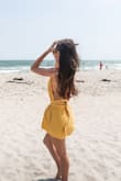 The romper has really nice fabric, and wearing it gives me an almost weightless feeling. The fabric that ties at the top is a little long, so I had to wrap it around the waist. - Gina G.