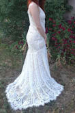I am very impressed with this dress. I have decided to wear it on our wedding day. The lace is very pretty, and the train is lovely. I might have to have it altered though. I'm on the short side and it definitely drags. I do think that a small would have worked. I might order a small one just to compare the two. - Taylor P.