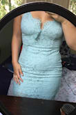 The dress is very well made, gorgeous in person. I'm a M in everything but wanted this dress so much that I was willing to risk a S (only one avail at the time) and it is a tad snug but I'm totally fine with that. You won't regret buying this lacy dress :) 2nd photo shows the colour better. Also, there is a "flap" at the front that you can see in the 2nd photo but just pin in when you wear it. - Lindsey F.