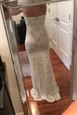 I bought this as a surprise second wedding dress for my big day. It's literally perfect! I have very small boobs and I'm on the shorter side so the dress is a little large in the chest and needs to be shortened, but that's the norm for me. Otherwise, it fits great and looks even better! - Rheana P.