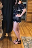 I bought this last summer and I absolutely adore it! Definitely something you can use to dress up or down. Have worn for a nice night out for dinner and to a college graduation, and I'm sure there's many more times to come. - Arielle K.