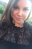This dress is so amazing! It's just SO flattering in black. It's sexy without being revealing. I wore it to a California wedding at a winery and felt so confident. I got so many compliments! It kind of shows off your sexy bust but doesn't show too much skin or cleavage. I'm very curvy right now and it was also surprisingly slimming for a very fitted dress! I can't wait to wear it to another event because I will definitely be repeating this outfit many times! Buy this! - Kelly L.