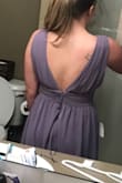 The material is really nice! And I continually get compliments from people I show the dress to how beautiful the color is. I'm very short so I did have to get the straps altered about an inch shorter, otherwise I would have a nip slip. I love how deep cut it is and love the back. It is a bit heavy, there are 3 layers in the skirt and it makes the dress a bit too thick in the waist where it makes you look a lot bigger in the middle. The zipper in the back made my bum look really weird, and the 3 layers in the skirt had been sewn together where it puckered along the seam. My seamstress pulled the seams out and it looked 100 times better, and is going to try and fix the zipper puckering as well. I had to do a lot of alterations on this dress to make it look the way I had imagined, but I think being taller and bigger chested you wouldn't need much. Ultimately I love this dress and I'm excited to wear it to my friend's wedding. - Sarah M.