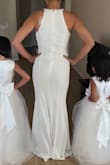 This dress fits perfectly! Chic, modern with clean lines. I'm using these dresses for my bridesmaids for an all white wedding! My only concern is that it is a little see through. Hopefully with nude Spanx, it won't be as noticeable. - Jennifer P.