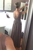 This dress is beautiful, love the material and the long slit. Unfortunately it was a bit big in the breast area and looked baggy on the top. If I had kept it I would have had to have the straps taken in and I'm sure it would have looked great. I was between this and another dress and the other wouldn't have required alterations so naturally I went with the other. If your girls are on the bigger side I'm sure it would look lovely! - Alyssa H.