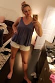 First, I have to say how much I love the color. The fabric is soft and flowy, so it's a very comfortable shirt. I like that it dips in the back, but it's hard to decide what kind of bra to wear with it. It covers the bra, but it's so flowy that it can sometimes be revealing. - Beata A.