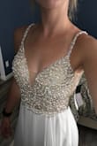 Where do I start with this dress?! I absolutely love it and the pictures do not do it justice. I wasn't doubting the quality when I ordered it, but it far exceeded my expectations for only costing $250. I purchased this dress for my wedding in Colorado next year. The only alterations I will be making is a hem (about 3 inches) and swapping out the cups for a push-up since I am very small-chested and there is still some room in the cups even with a sticky bra. Overall, I am extremely happy with this dress & can't wait to wear it on my wedding day! - Jamie E.