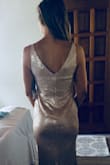 This dress is absolutely stunning! I wore it as a bridesmaid dress and I didn't want to take it off! I was a bit nervous about ordering a small but am so glad I did based on the other reviews. There is just enough stretchy material to show off your curves without being too tight, allowing for the perfect fit. I'm pretty tall and somewhat busty, and the size small fit so well, I feel like the dress was made just for me! Definitely recommend buying this dress. - Ilona J.