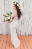 I ordered this dress as a backup for my wedding. Every review was so positive and the price was so reasonable, I figured why not! I LIKED my original dress but wasn't in love with it. The second I tried this one on, I didn't want to take it off. I knew my original dress was done and this was the dress I was walking down the aisle in. We had a barn wedding, I had a huge flower crown, so the simplicity yet elegance of this dress was absolutely perfect. It fit like a glove, but most importantly I felt SO good and comfortable in it. The only adjustment I had to make was get it trimmed a little bit because it was too long for me. I was able to leave the back long and the front just right for me. I would recommend this dress to anyone! It was perfect for my special day and I was completely in love with it ! - Adriana B.