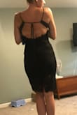 The dress fits exactly how I hoped. I don't usually get dresses that are backless because of the bra issue. Although I don't have big breast, I wanted some type of bra to give the illusion that I had more than I do to add some curve lol. So I had planned to buy the sticky type bra. I was happy to find that the dress is snug enough in the top that I just put two bathing suit or bra liners (they were just in my drawer from something they fell out of) in and those would actually work. I might still try the sticky bra for the occasion that I bought this dress for, but at least I know this is an option. 
I realize now that I'm going to have an issue with my back tan line, so that's an added obstacle while being out in the sun this summer. The quality is great. I am very happy with it! - Ashleigh D.