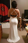 This dress is very comfortable and it hugs your curves well. Perfect for my beach wedding! The adjustable straps were solid and felt secure. The lace is beautiful and delicate looking. Slightly long for me, but that's an easy fix. - Tammie L.