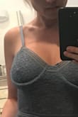 The bodysuit itself fits me, the bra area leaves much to be desired.  My bra size is 34DDD and the bra part has no definition.  So little so, that the bone in the bra area does nothing for the actual 'cup' area.  It's just a look and you really shouldn't have breasts bigger than maybe a small cup size.  the model in the picture shows it sitting properly.  on my the body suit pushes outward and i have the dreaded underboob look.  I like the body suit so i'll just keep it.  i hate to return things. but i'm a little bummed that there weren't a lot of reviews about this issue when i bought it.  hopefully my review helps someone like me.  It doesn't sit well on me and when i stand up properly there is a lot of slack.  in these photos i am extending my chest out forward to show how the cup line is literally half over my actual breast.  lol.  not a good fit. - Larissa T.