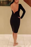 I bought this dress because of the photos and the reviews and I've always wanted an open back dress. I agree with other reviews: the back does not go as low as the photo looks, which I like. The side zipper helps with getting it on and off, but mine causes some bunching on that side. It is not ideal but I'm OK with it! Overall, it is a nice dress! - Catherine N.