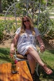 I got so many compliments on it, it does run long though I had to get about 3 inches off and it's still a little longer than the model picture but all Lulus dresses run long. Thick enough to not have to wear a bra! - Stephanie H.
